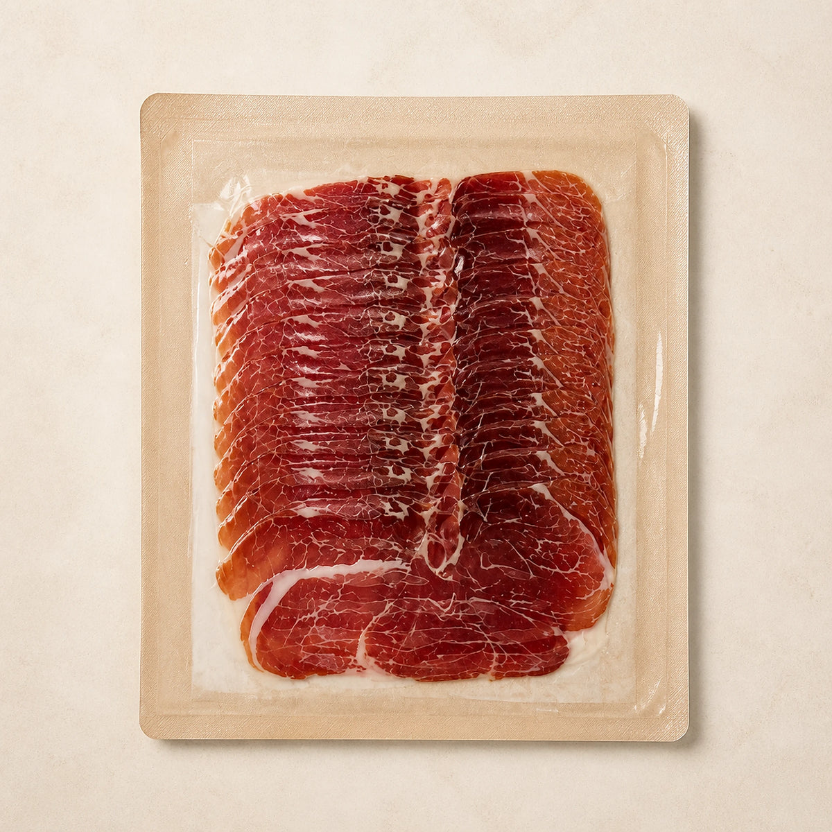 Sobre de paleta de jamón loncheada La Matillana sobre fondo claro